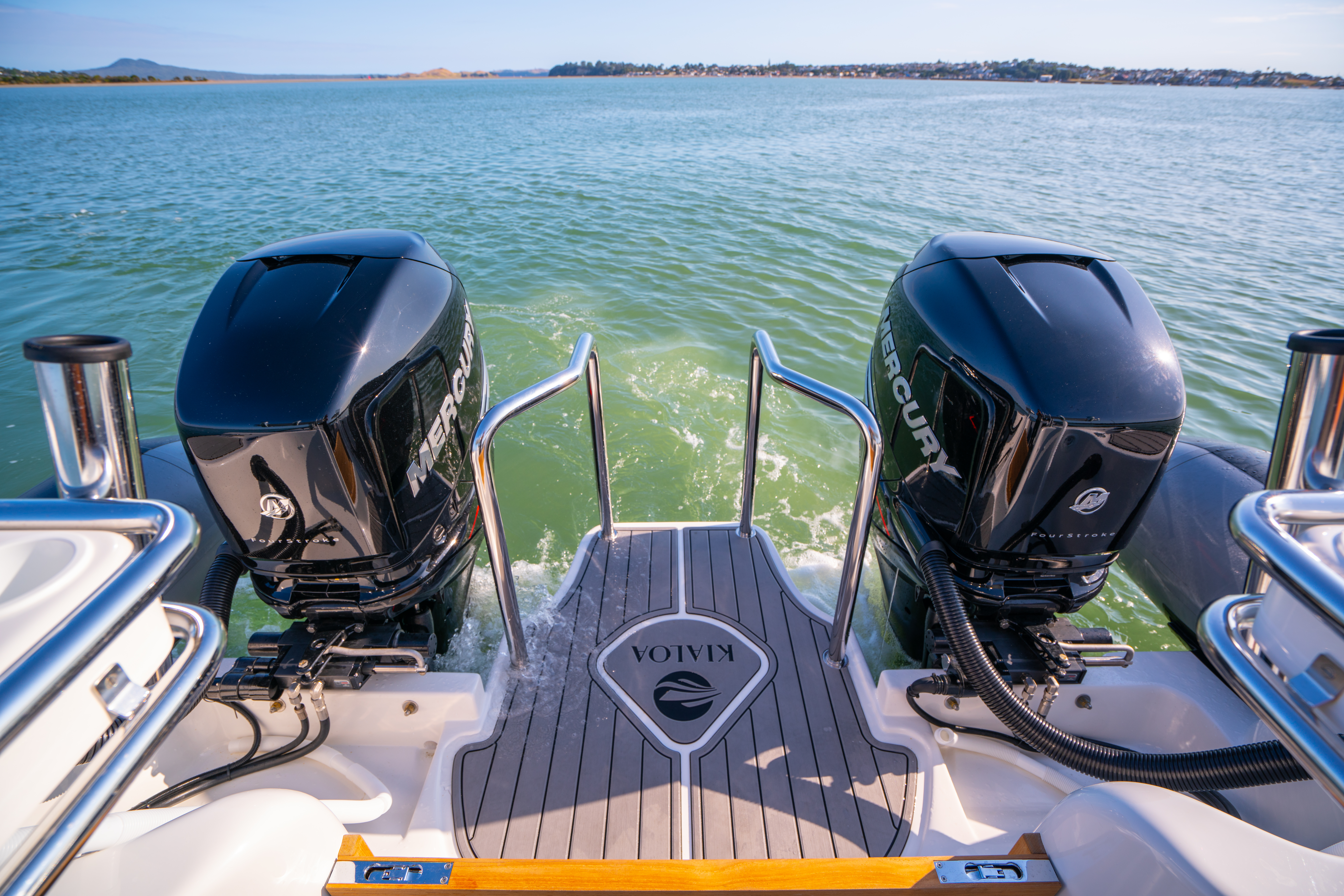 Walk through swim platform for twin outboard configuration